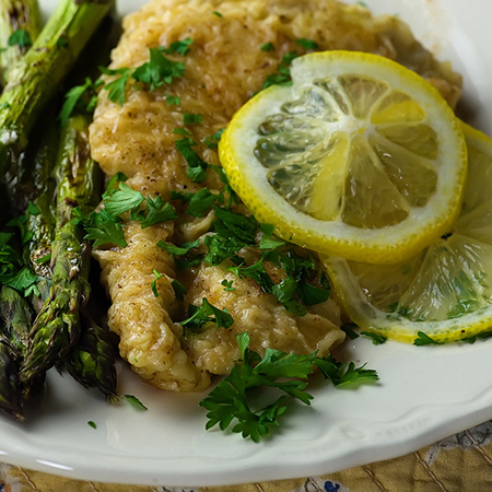 image of chicken piccata with asparagus